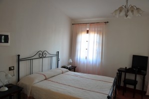 Basic double with pool view, an extra bed, private facilities (bath and shower), and breakfast