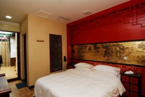 Comfort double with garden view, king bed, private facilities (bath and shower), and breakfast