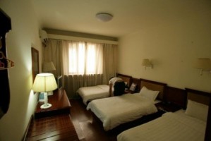 Deluxe triple with city view, and private facilities (bath and shower)