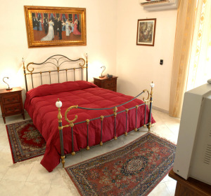 2 person basic suite with city view, balcony, and private facilities