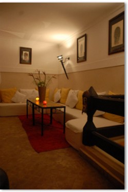 4 person extra large suite with patio view, king bed, and private facilities (bath and shower)