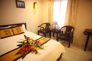 Deluxe double or twin with city view, balcony, and private facilities (bath and shower)