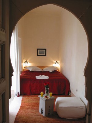 Superior double with patio view, king bed, and private facilities (bath and shower)