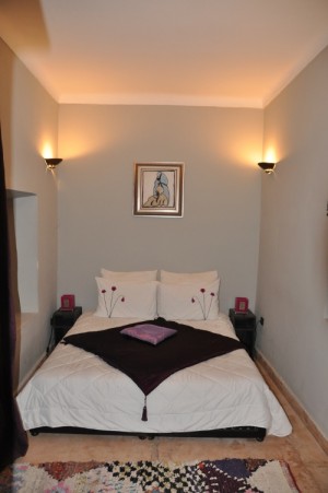 Superior double with patio view, queen bed, and private facilities (shower)