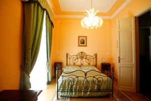 Basic triple with city view, balcony, and private facilities (shower)
