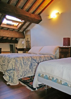 Superior triple with city view, king bed, and private facilities (shower)