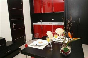 2 person junior 1 room suite with balcony, and private facilities (bath and shower)
