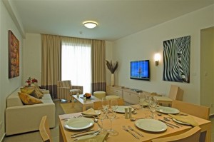 Superior quad with inland view, balcony, and private facilities (bath and shower)