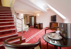 4 person executive penthouse with mountain view, king bed, and private facilities (bath and shower)
