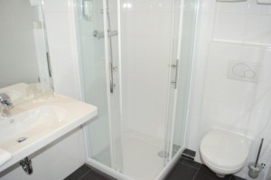 Standard triple with private facilities (shower)