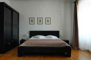 4 person standard apartment with city view, king bed, and private facilities