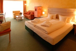 Superior single with garden view, balcony, and private facilities (bath and shower)