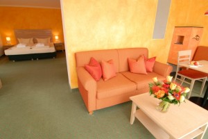 2 person deluxe 2 room suite with panoramic view, balcony, and private facilities (bath and shower)