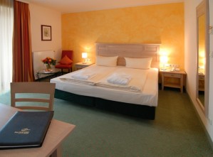 Standard single with garden view, balcony, and private facilities (bath and shower)