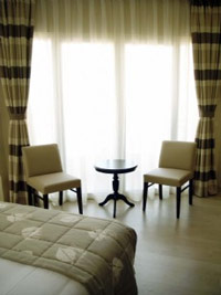 Deluxe double with sea view, balcony, and private facilities