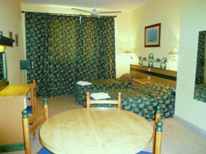 3 person basic studio with city view, balcony, and private facilities (bath and shower)