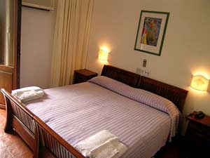 Superior double or twin with garden view, balcony, an extra bed, private facilities (shower), and breakfast