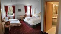 Family quad with mountain view, private facilities (shower), and breakfast