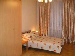 2 person comfort 2 room apartment with city view, queen bed, an extra bed, and private facilities (bath and shower)