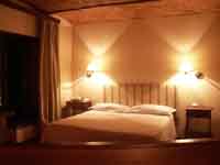 Superior double with panoramic view, private facilities (bath and shower), and breakfast
