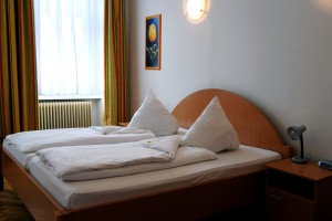 4 person comfort 2 room suite with city view, french bed, and private facilities (shower)