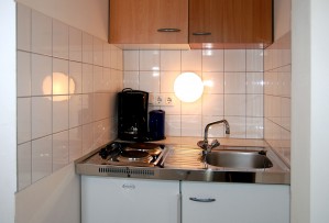 2 person comfort studio with city view, french bed, and private facilities (shower)