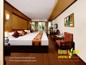 Family triple with city view, queen bed, and private facilities