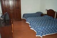 Comfort triple with city view, private facilities, and breakfast