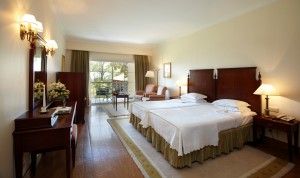 Standard single with garden view, balcony, private facilities (bath and shower), and breakfast