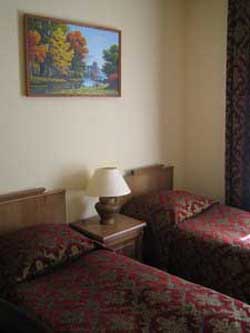 Large twin with city view, private facilities, and breakfast
