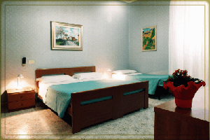 Comfort triple with city view, queen bed, private facilities, and breakfast