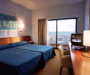 Standard triple with sea view, balcony, private facilities, and breakfast