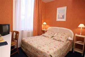 Standard single with garden view, and private facilities (bath and shower)