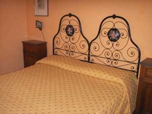 Superior double with panoramic view, king bed, private facilities (bath and shower), and breakfast