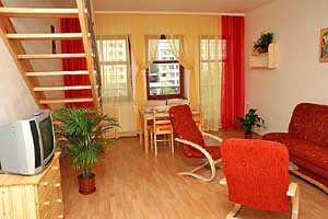 4 person large apartment with balcony, an extra bed, and private facilities (bath and shower)
