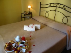 Comfort triple with city view, balcony, private facilities (bath and shower), and breakfast