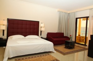 Junior quad and 1 child with sea view, balcony, and private shower shared toilet