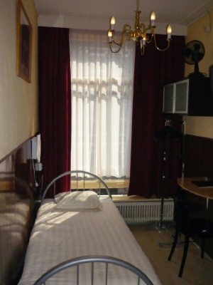 Budget single with private shower shared toilet, and breakfast