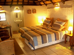 Standard twin with garden view, balcony, and private facilities (shower)