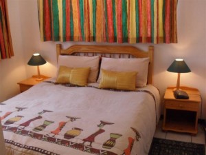 2 person superior 1 room suite and 2 children with sea view, queen bed, an extra bed, and private facilities (bath and shower)