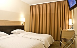 Standard double or twin with private facilities, and breakfast