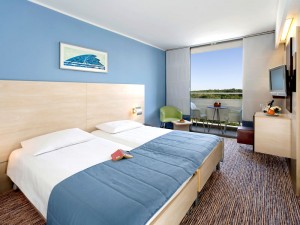 Superior twin with garden view, balcony, private facilities (shower), and half board