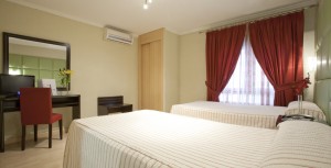 Standard double and 1 child with city view, and private facilities (bath and shower)