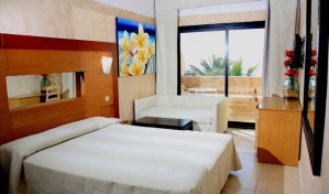 Comfort single with balcony, private facilities (bath and shower), and half board