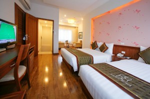 3 person family suite with city view, balcony, private facilities (bath and shower), and breakfast