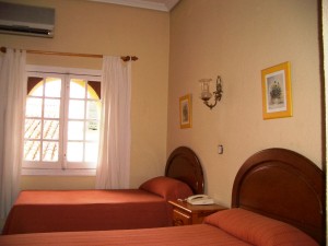 Standard double or twin with private facilities (bath), and breakfast