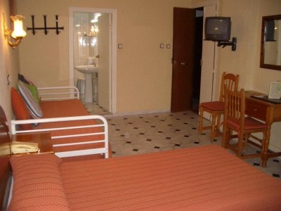 Standard triple with private facilities (bath), and breakfast